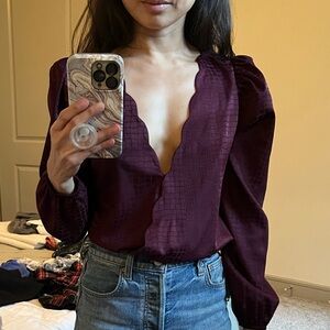 Socialite maroon size XS deep V neck bodysuit in EUC.